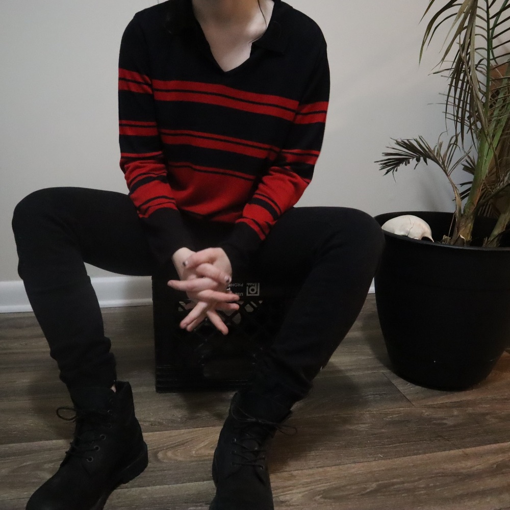 collared red and black stripped sweater.